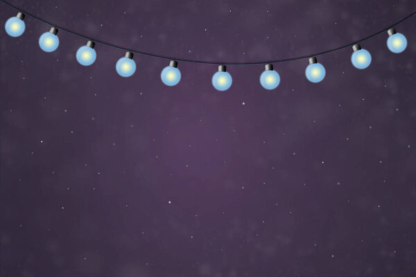 Christmas garland of light bulbs on a dark blue background. Copy space. New Year background.