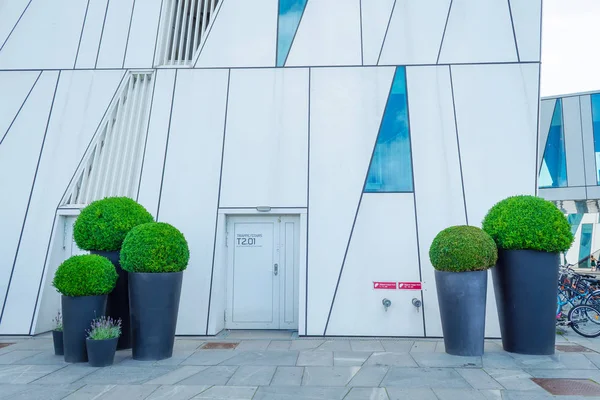 Copenhagen. Denmark. July 24th. 2019: The beautiful glass building of the Bella Sky Comwell Hotel. Architecture. — Stock Photo, Image