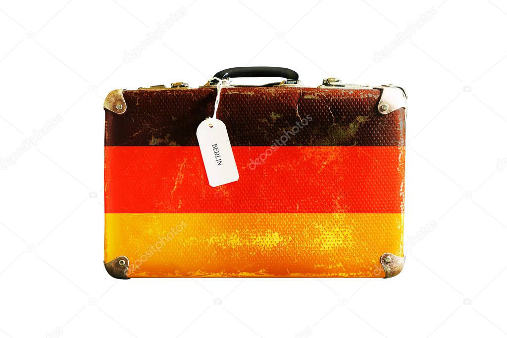 Old suitcase with the flag of Germany. Isolated on a white background