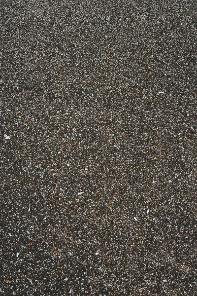 Patrón de textura de arena volcánica parpadeante negra. Cabo Verde. antecedentes — Foto de Stock