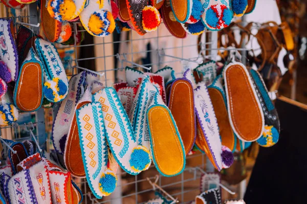 Souvenir shop. Traditional slipper Tsarouchi shoes. Greece