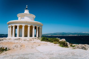 Lighthouse of St. Theodore at Argostoli against clear blu sky. Kefalonia island. Greece clipart