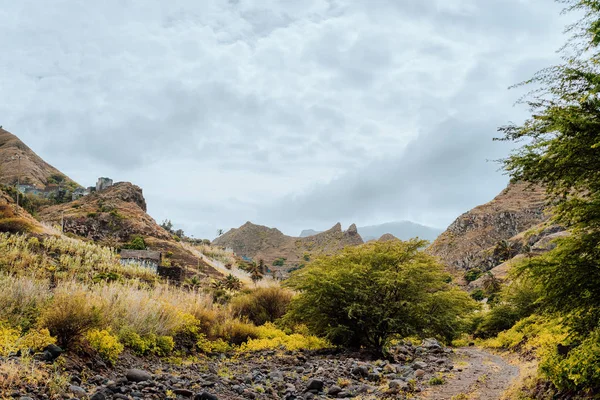 Rural landscape at cloudy weather Santo Antao Island, Cape Verde. Amazing mountains and dry riverbeds. — Stock Photo, Image