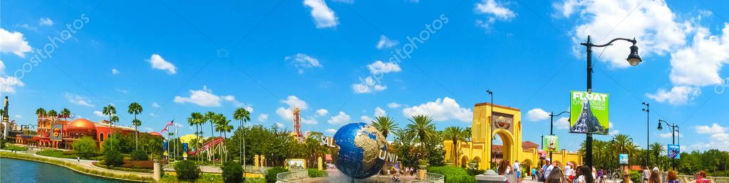 Orlando, USA - May 8, 2018: The people going to main entrance to park Universal Studios. Universal Studios is one of Orlando famous theme parks.