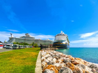 Falmouth, Jamaica - May 02, 2018: Cruise ship Disney Fantasy by Disney Cruise Line docked in Falmouth, Jamaica clipart