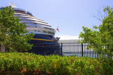 Falmouth, Jamaica - May 02, 2018: Cruise ship Disney Fantasy by Disney Cruise Line docked in Falmouth, Jamaica clipart