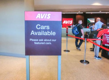 Miami, Florida, USA - Aprile 28, 2018: The Avis rental car office at Miami airport clipart