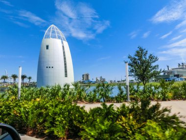 Cape Canaveral, USA - April 29, 2018: Exploration Tower is located at the Port of Canaveral and features fun exhibits and an observation deck overlooking the port. clipart