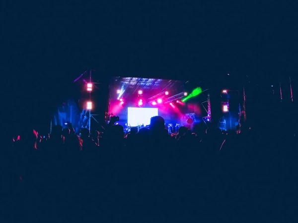 Crowd raising their hands and enjoying great festival party or concert. — Stock Photo, Image