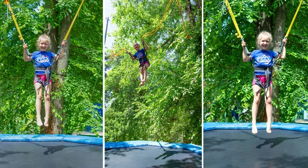 Fille Heureuse Souriante Sautant Avec Bungee Dans Trampoline Parc Contre — Photo