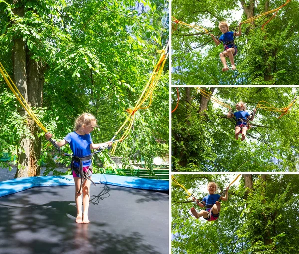 Menina Feliz Sorrindo Pulando Com Bungee Trampolim Parque Contra Árvores — Fotografia de Stock