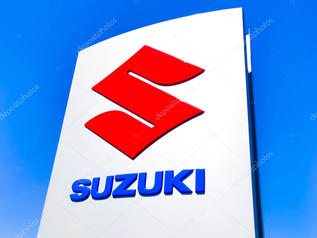 Kyiv, Ukraine - August 15, 2020: Suzuki logo at store at Kyiv, Ukraine on August 15, 2020. Suzuki Motor Corporation is a Japanese multinational corporation headquartered in Minami-ku, Hamamatsu, Japan.
