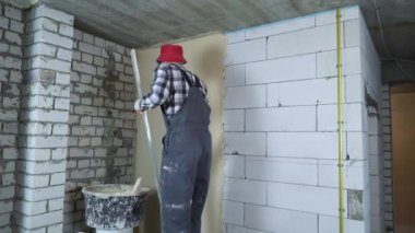 alçı inşaat cetvel ile gaz Beton taş duvarda tesviye Oluşturucu