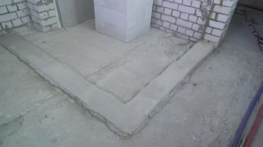 Beton Vakfı yeni bir tuğla duvar döşeme için hazır kadeh kaydırmak