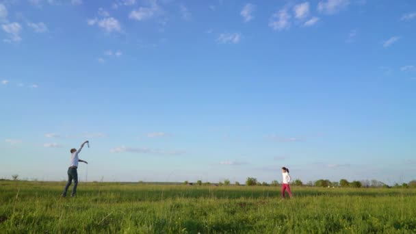 Active family spending happy fathers day by playing sports game outside — Stock Video