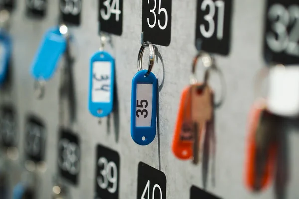 Closeup stand of locker key at reception Stock Image