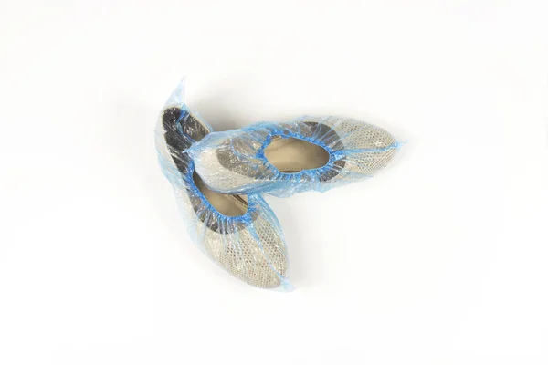 Beyaz arka planda mavi ayakkabı kapakları kadın ayakkabıları, izole