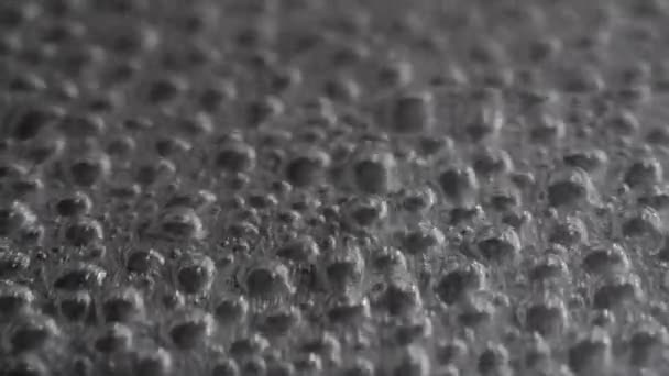 Abstract close-up on the surface of boiling water — Stock Video