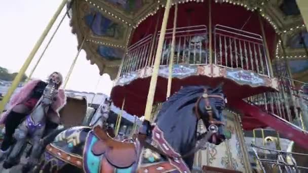 Plus size stylish girl riding carousel, challenging body image stereotypes — Stock Video