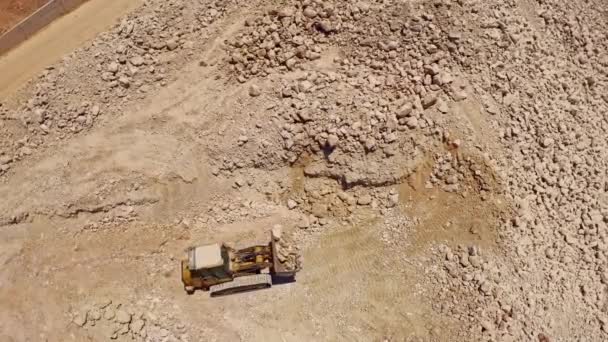 Heavy Tractor Moving Rocks Construction Site Aerial Drone View — Stock Video