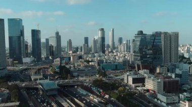 aerial video of cityscape and road with cars