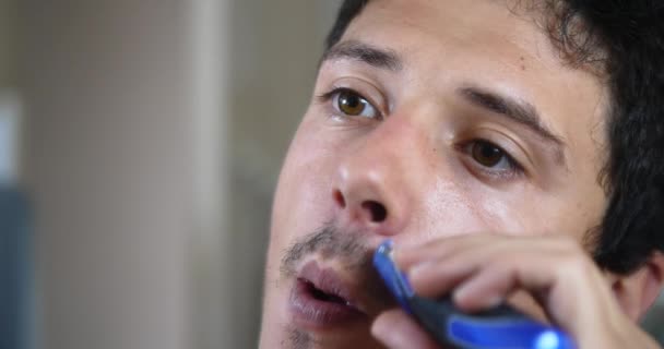 Young Attractive Man Shaving Electric Shaver Front Mirror Bathroom — Stock Video