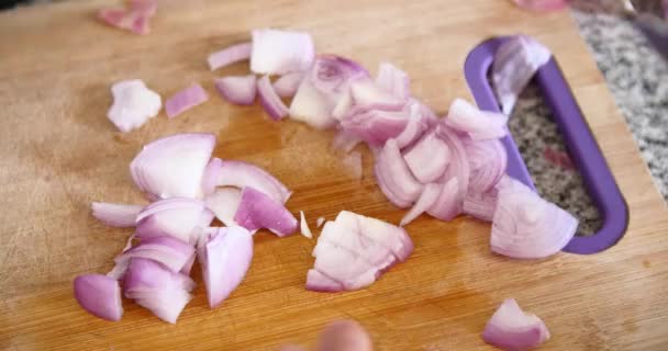 Young Man Chopping Onions Wooden Board Kitchen Knife — Stock Video