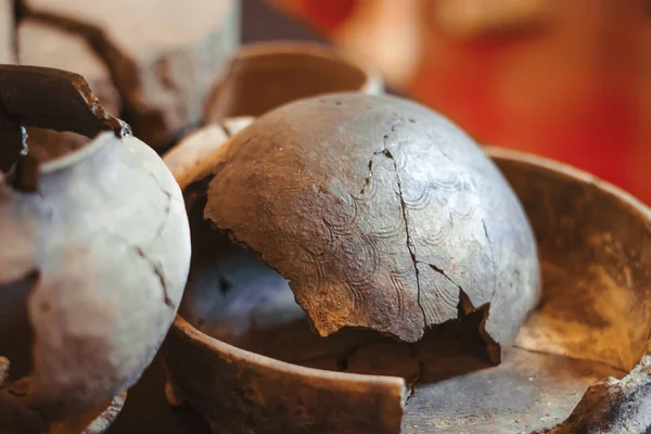 old clay jug with cracks