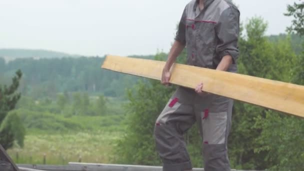 The worker is building the roof — Stock Footage Worker Building Roof Video Clip