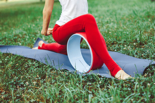 girl doing yoga outdoors