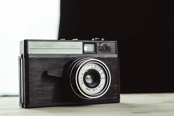 Old film camera. White background close-up.