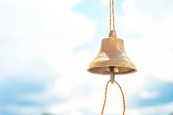 the bell hangs on a rope