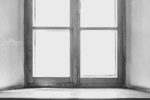 Wooden window. Wide wooden sill.