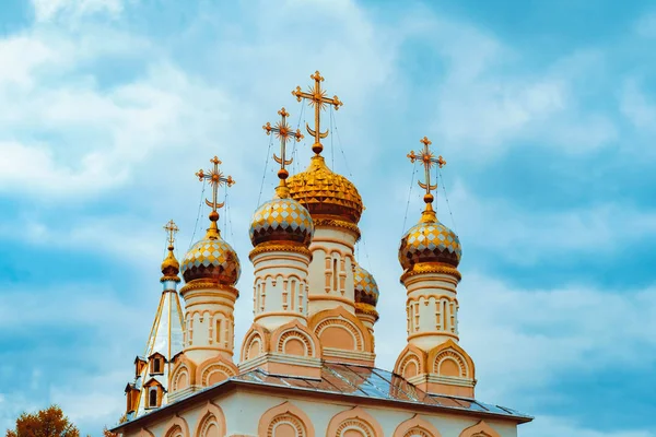 Russian Church Golden domes in the blue sky