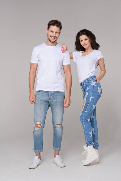 Happy summer couple wearing jeans
