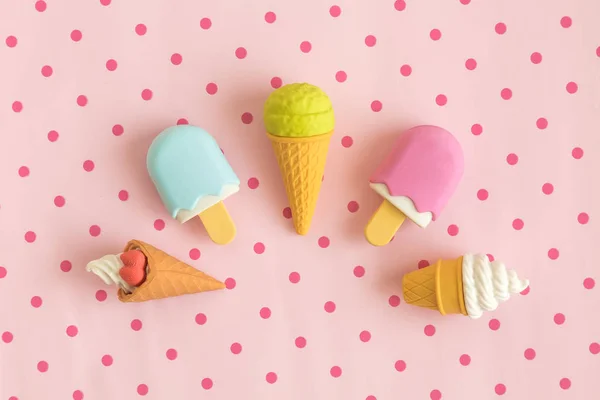 Ice cream on stick and in wafer cone abstract on polka pink background. — Stock Photo, Image