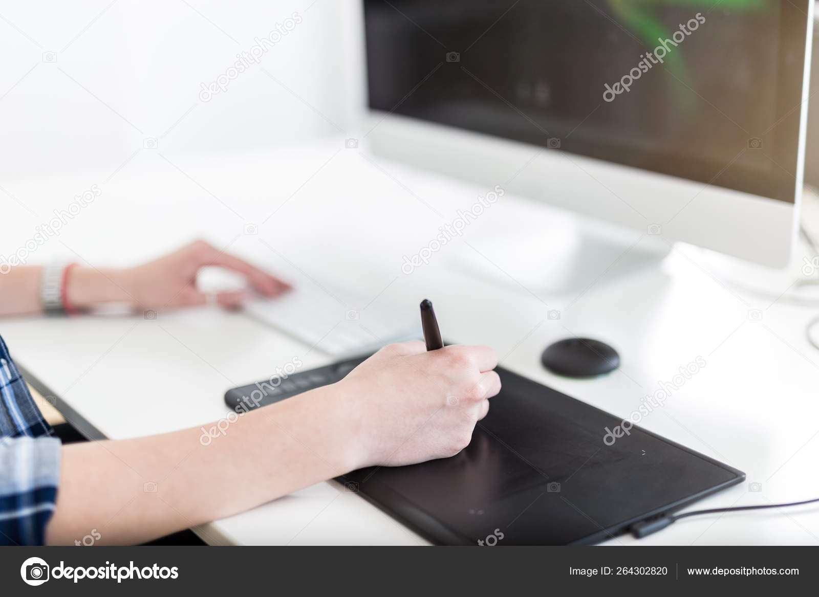 Graphic Designer Drawing On Pad And Pressing A Button On Computer Keyboard Stock Photo C Zoff Photo 264302820