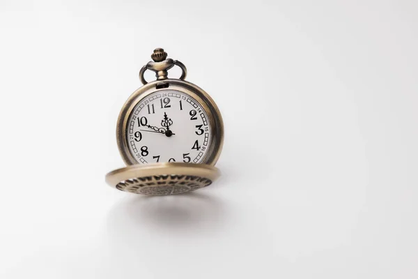 Old pocket watch closeup isolated on white background Royalty Free Stock Photos