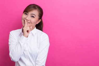 Asian woman make quiet gesture clipart