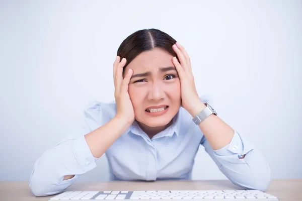 Angry woman screaming out and pulling her hair Stock Image