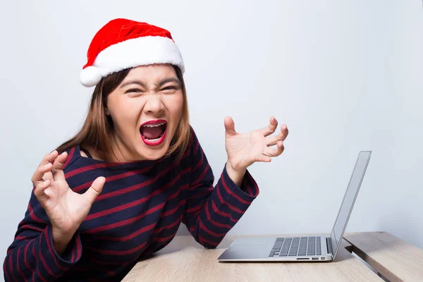 Angry woman at work in christmas day