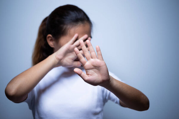 Sadness of a woman in the dark