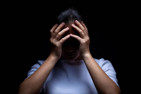 Sadness of a woman in the dark — Stock Photo, Image