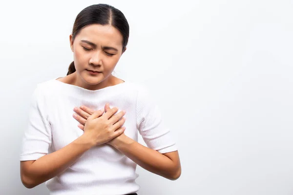 Woman has chest pain — Stock Photo, Image