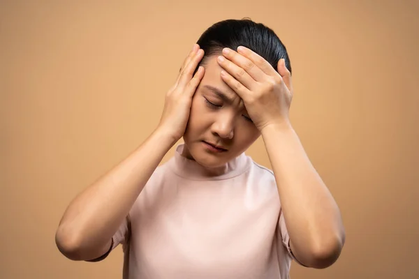 Asian Woman Sick Headache Touching Her Head Standing Isolated Beige — Stock Photo, Image