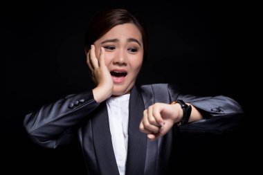 Woman check her watch she is late clipart