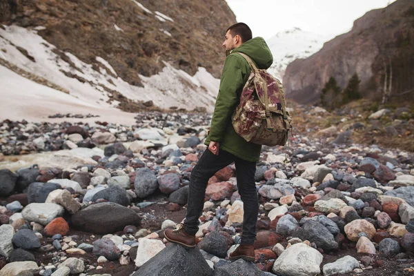 Young Hipster Man Hiking Mountains Winter Vacation Traveling North Snow Stock Photo marymandarinka 402440250