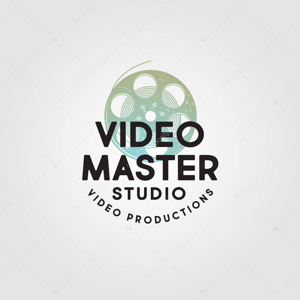 Video Master logo. Video Production Studio emblem. Symbol of cine-film with letters. Scratches, shabby style.