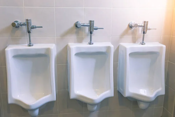 Urinals for men in the male bathroom — Stock Photo, Image