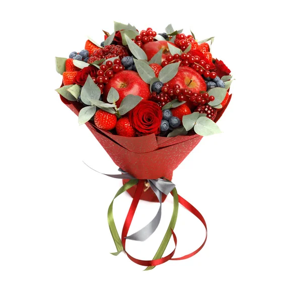 Beautiful bright red edible bouquet of fruits and flowers on a white background